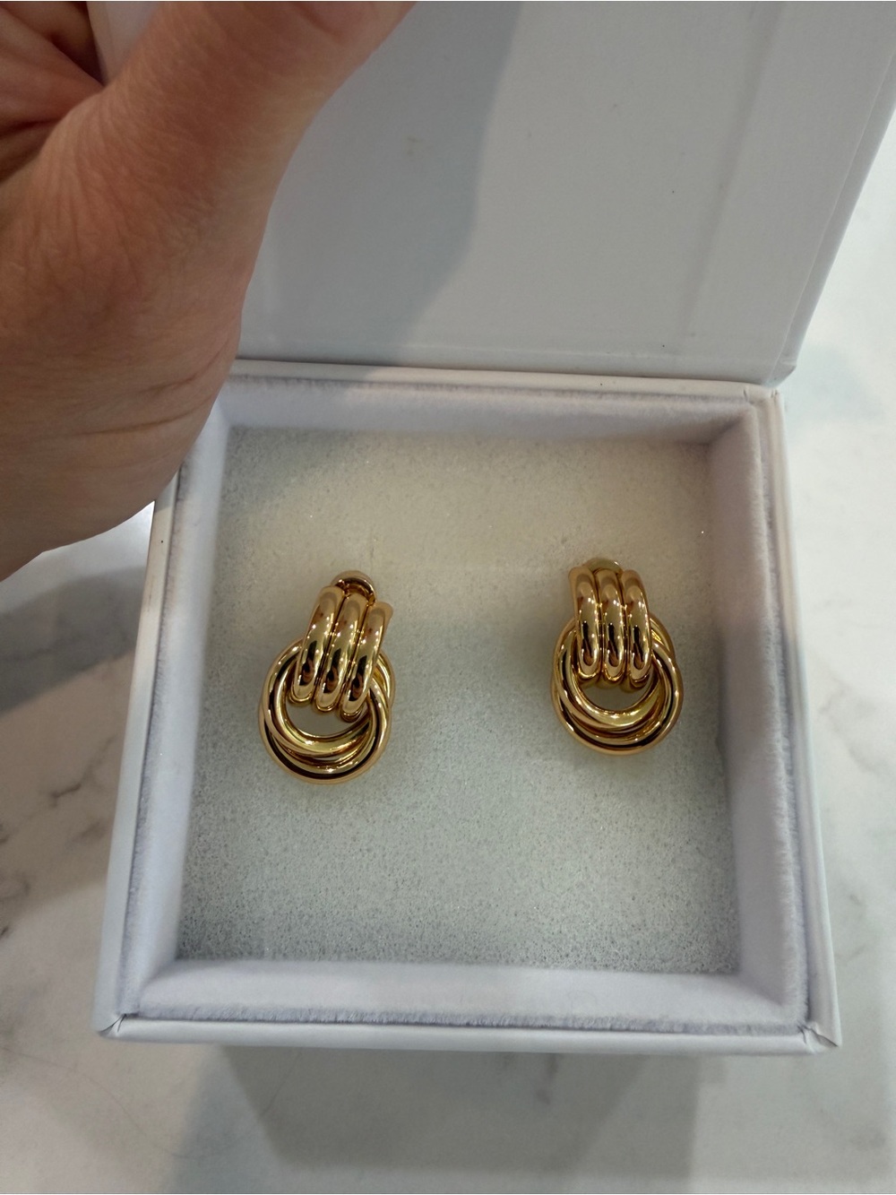 Heaven Mayhem baby knot gold earrings